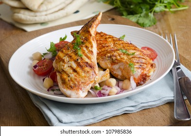 Harissa Chicken With Chickpea And Tomato Salad