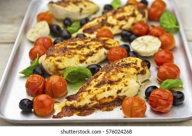 Harissa Chicken With Olives, Tomatoes And Garlic 