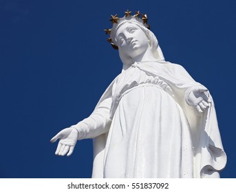 Harissa, Our Lady Of Lebanon Statue Against A Blue Sky