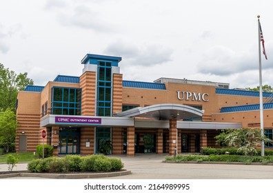 Harmar Township, Pennsylvania, USA May 23, 2022 The UPMC, University of Pittsburgh Medical Center, outpatient center entrance on a spring day