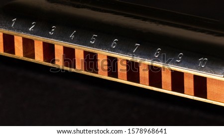 Harmonica. Close up. Macro on black background
