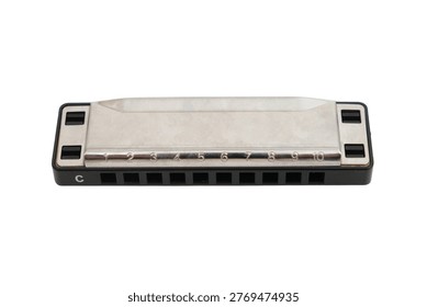 Harmonica isolated on white background. Metal mouth organ for musical performance. Blues instrument for melody creation. Professional gear for musician. Classic acoustic wind miniature device.