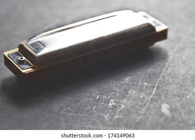 harmonica on chalckboard