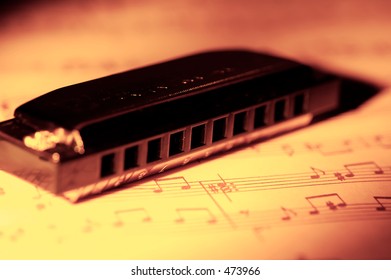 Harmonica and Sheet Music