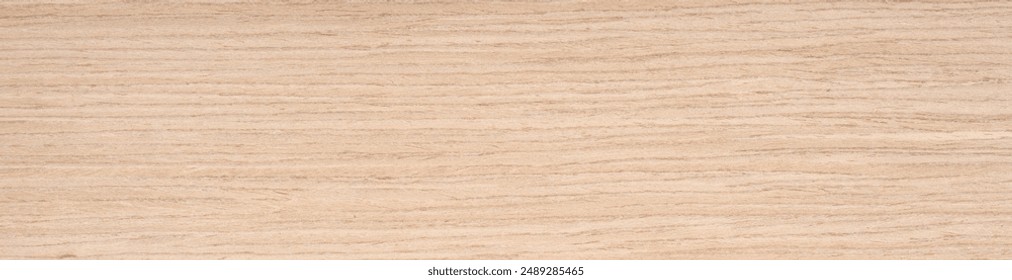 A harmonious blend of sandy beige and soft golden hues across a smooth oak wood veneer