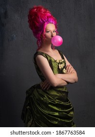 Harmony Of Contrasts, A Fun Concept Of Mixing Old And New. Royal Person In The Style Of Old Portraits With Bright Pink Hair Chewing Gum