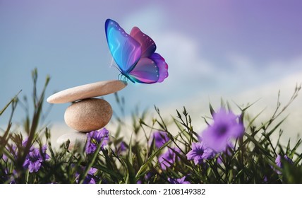 Harmony of Life Concept. Surrealist Butterfly on the Pebble Stone Stack in Garden. Metaphor of Balancing Nature and Technology. Calm, Mind, Life Relaxing and Living by Nature