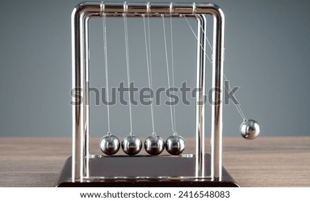 Harmony in Motion: Newton's Cradle Demonstrates the Beauty of Physics