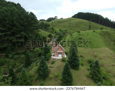 HARNESS STYLE CHURCH. LOCATED IN SOUTH BRAZIL. SANTA CATARINA. CHURCH SURROUNDED BY NATURE. AT THE TOP OF THE MOUNTAINS.