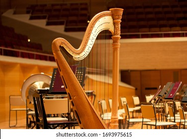 Harp In A Large Concert Hall. Musical Instrument.The Concert Harp