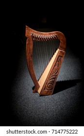 Harp On A Dark Background