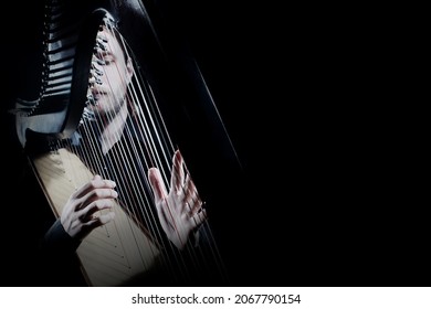 Harp Player. Irish Harpist Playing Celtic Music. Classical Musician