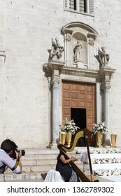 Harpist And Wedding Decoration Bari Cathedral Exterior On July 14, 2018 Puglia Italy