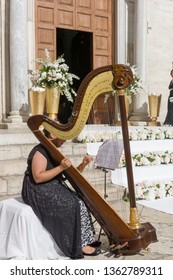 Harpist And Wedding Decoration Bari Cathedral Exterior On July 14, 2018 Puglia Italy