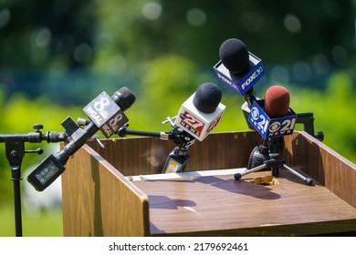 Harrisburg, PA, USA – July 13, 2022: Broadcast News Media Microphones Positioned On A Podium Prior To A News Conference And Remarks By A Public Official.