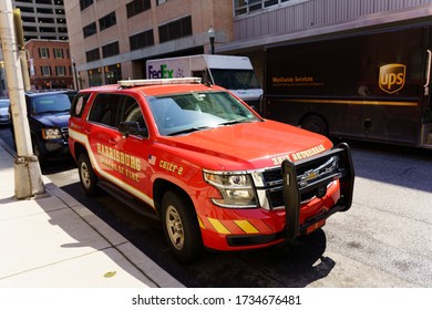 Harrisburg, PA / USA - May 15, 2020: The Harrisburg Fire Department’s Chief’s Car, Parked Along A City Street.