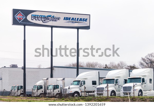 Harrisburg, USA - April 6, 2018: Sign on\
highway 83 north in Pennsylvania for five star truck leasing\
company called\
idealease