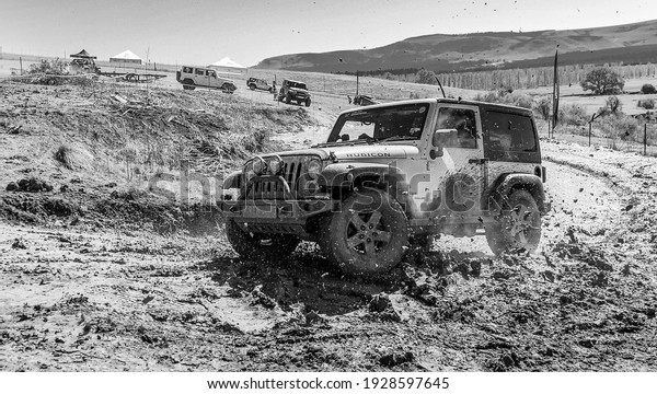 HARRISMITH, SOUTH AFRICA - Feb 20, 2021:\
Harrismith, South Africa - October 02 2015: 4x4 Mud Driver Training\
at Camp Jeep in the\
Drakensberg