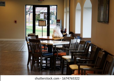 Harrisonburg, VA, USA - 3/16/2020: Empty Tables At A Café In A Retirement Community Allowing Only Care-away (take-out) Food During COVID-19 Outbreak.