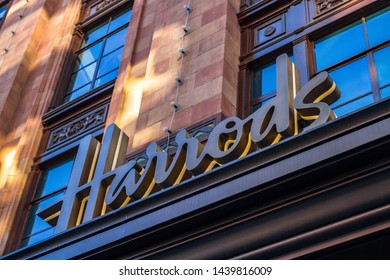 Harrods Shopping Mall Sign. With over 330 departments, Harrods is the biggest department store in Europe. London,UK-April 2019