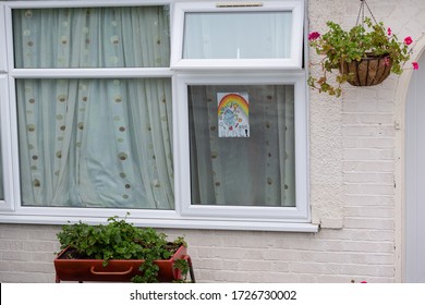 Harrow, Middlesex / U.K - May 9th 2020: "Thank You NHS" rainbow sign in a house window. These are displayed across the UK as a symbol of support for health and key workers during the COVID-1