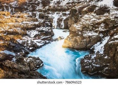 Harunfossar waterfalls, Iceland. One of the beautiful waterfalls in Iceland. Hraunfossar, a waterfall formed by rivulets streaming over Hallmundarhraun.