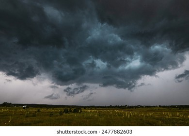 The harvest in the fields of Montana. The enormous storm cloud covered the sky - Powered by Shutterstock