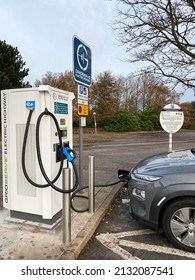 Harworth, UK - December 11th 2021: Public Electric Car Charging At A Motorway Service Station.