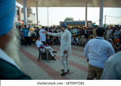 Haryana, India December 9 2020: Artists Performing Nukkad Natak (street Play) Highlighting Farmer's 
Sad Story. Farmer+ Protest Against Central Government's New Agricultural Law.