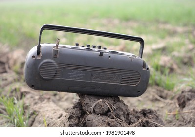 Haryana, India, January, 03, 2017 : Old Vintage Cassette Radio Outdoors In Agricultural Field. 