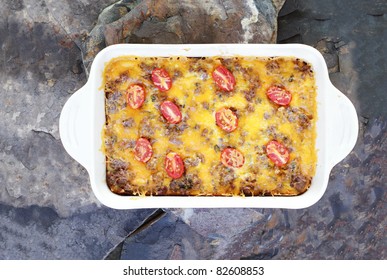 Hash Brown Strata Or Breakfast Casserole Made With A Crust Of Hash Browns, Eggs, Sausage And Cheddar Cheese.