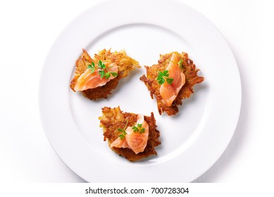 Hash Browns And Salmon Isolated On White Background. Top View