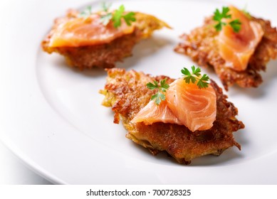 Hash Browns And Salmon Isolated On White Background.  