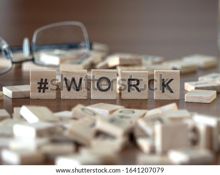  hashtag work concept represented by wooden letter tiles