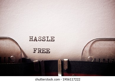 Hassle free phrase written with a typewriter.