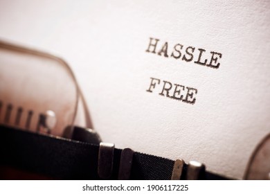 Hassle free phrase written with a typewriter.
