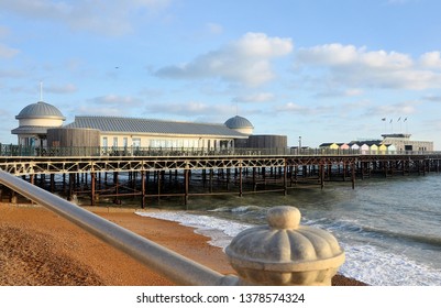 HASTINGS, SUSSEX, UK - DECEMBER 25, 2018. The Pier Opened In 1872, Designed By Eugenius Birch And After A History Of Fire And Storm Damage Restored In 2016 At Hastings, Sussex, UK.