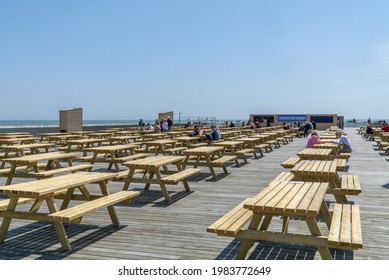 Hastings, UK - 30 May 2021: Hastings Pier Beer Garden And Bar Overlooking The Sea, Sussex