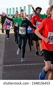 Hastings,East Sussex/UK 03-24-19 The Buckswood School Mini Run 2019. A Few Of The Participants Aged Between 7 And 16 Pass The Azur Marina Pavilion On The St Leonards On Sea Seafront