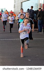 Hastings,East Sussex/UK 03-24-19 The Buckswood School Mini Run 2019. A Few Of The Participants Aged Between 7 And 16 Pass The Azur Marina Pavilion On The St Leonards On Sea Seafront