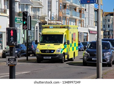 Hastings,East Sussex/UK 03-24-19 An On Call Emergency Ambulance Navigates Through The Traffic Lights At The Bottom Of London Road On The Seafront In St Leonards-On-Sea