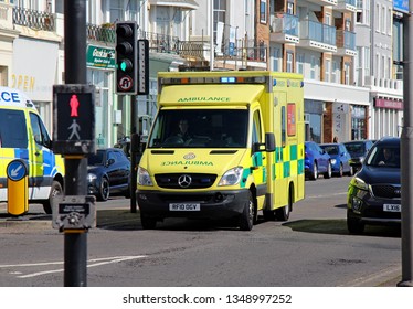 Hastings,East Sussex/UK 03-24-19 An On Call Emergency Ambulance Navigates Through The Traffic Lights At The Bottom Of London Road On The Seafront In St Leonards-On-Sea