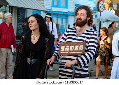 Hastings,East Sussex/UK 08-02-18 Hastings Pram Race 2018. Sirius Black  Is Proudly Carrying His Harry Potter Prisoner Of Azkaban Board Around Before The Race.