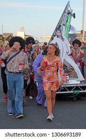 Hastings,East Sussex/UK 08-02-18 Hastings pram race 2018. An entertaining and colourful free event. A team with a Saturday Night Fever theme are pictured on the seafront