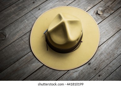 Hat Of Boy Scout On Wooden Background