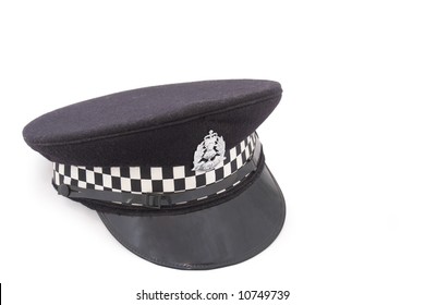 Hat Of British Police Officer On White Studio Background.