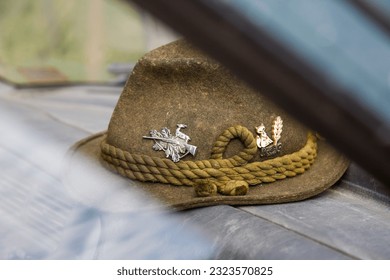 A hat is an indispensable accessory for hunters. - Shutterstock ID 2323570825