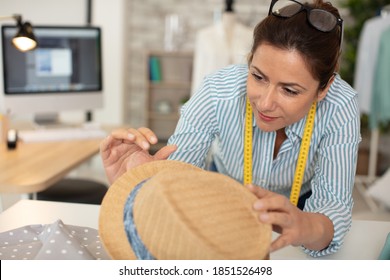 Hat Maker Working On Design In Studio