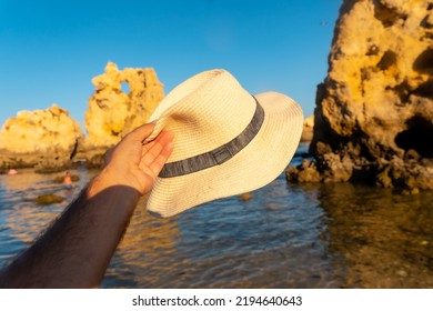 With A Hat At Praia Dos Arrifes, Algarve Beach, Albufeira. Portugal