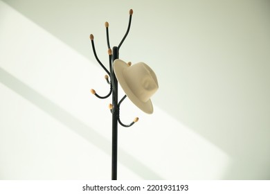 Hat Rack In An Empty Room On A White Background